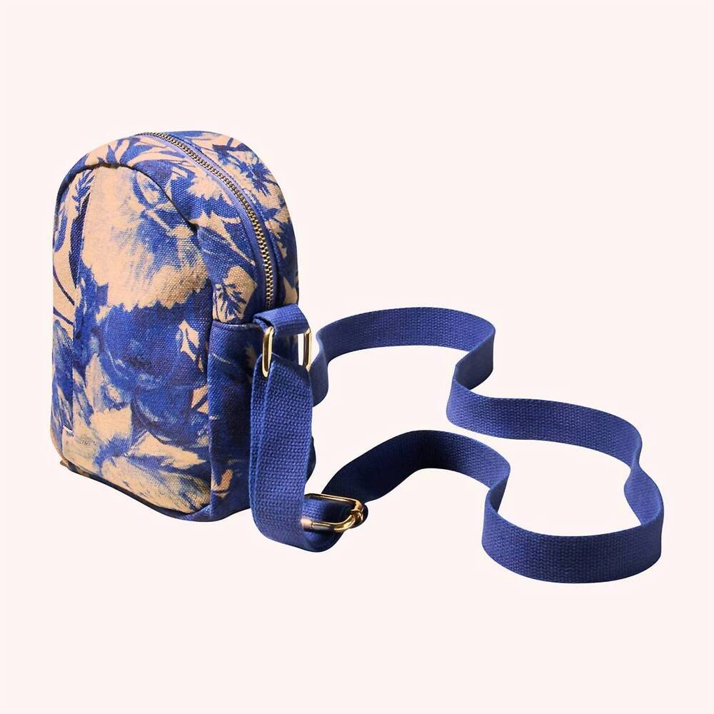 NEW POWDER DESIGN INC women's canvas out and about crossbody bag in china blue b